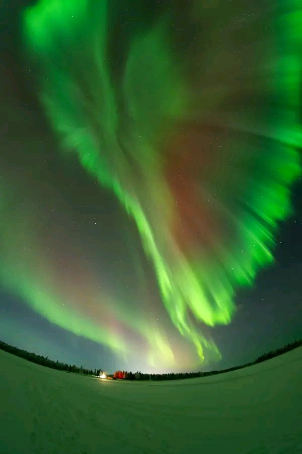 Stunning aurora formations tonight in North Pole, Alaska. This image was captured 20 minutes ago.